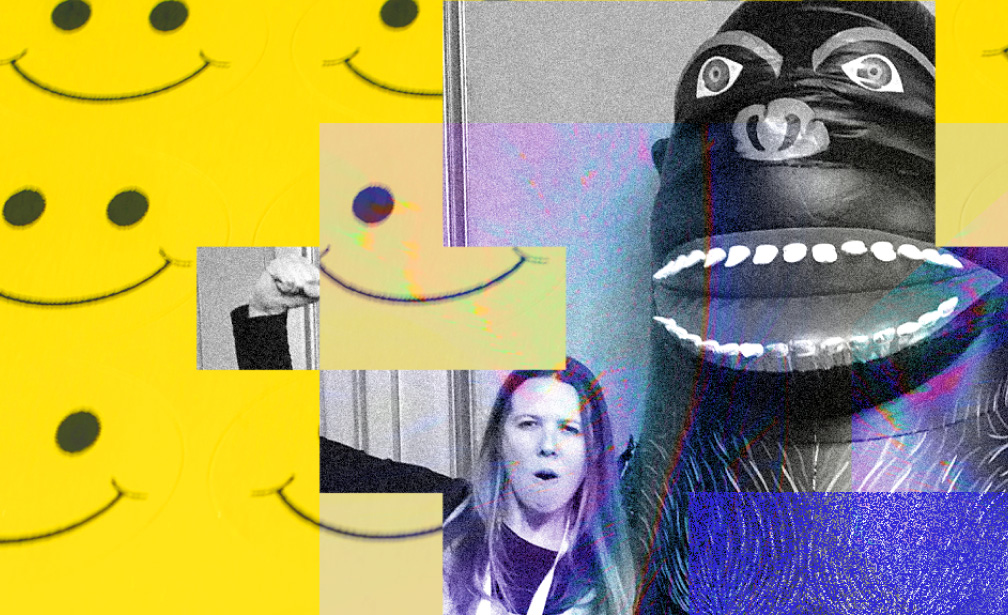 Girl standing next to mascot